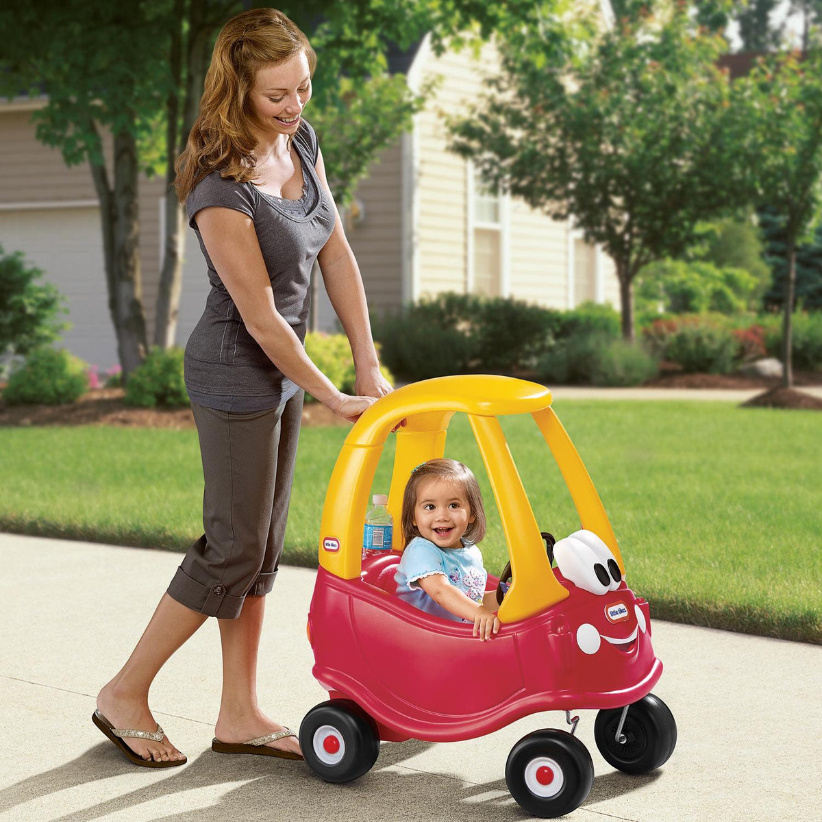 Parent pushing the coupe
