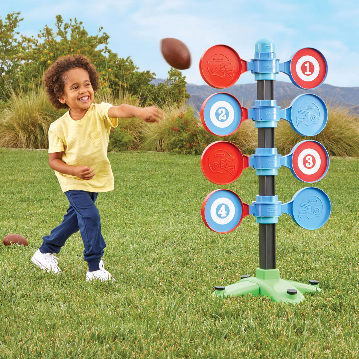 Boy throwing football