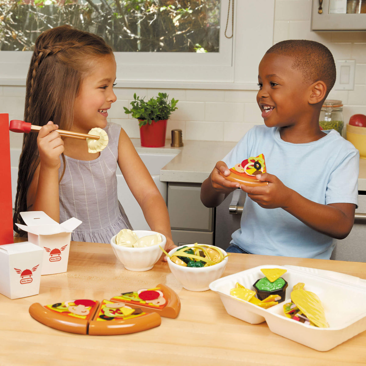 kids playing with the food set