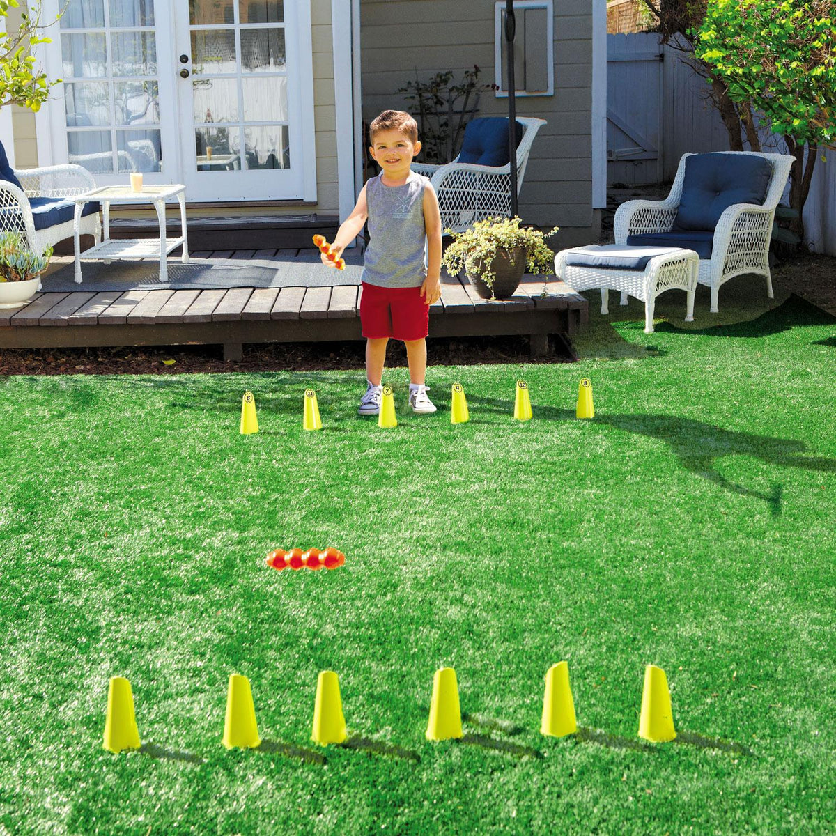 Try to knock down each of the opposing team’s 6 pins. When you knock down an opponent’s pin, add it to your line. Winner is the first team to capture all 12 pins!